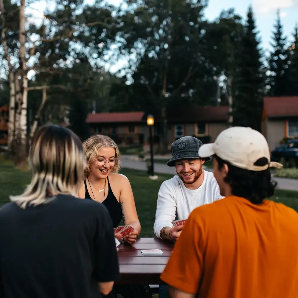 Playing board and card games outside